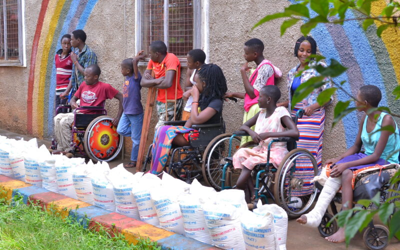 Member organization Partners For Community Transformation providing food relief to people with disabilities in Namutumba Rehabilitation Centre
